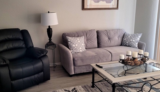 Charming townhome with 2 bedrooms and 2 baths in a gated 55+ community.