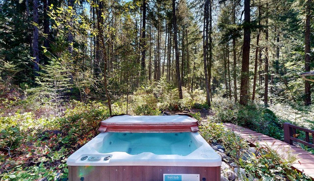 Dog-friendly, A-frame cabin with private hot tub - tranquil setting near skiing