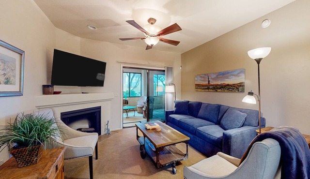 Dog-friendly mountain view condo with pool, gym, grill, fireplace, & sunroom
