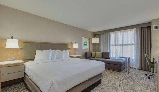 Enjoy an Eco-Certified Stay with Heated Pool, On-Site Dining, and I‑10 Access