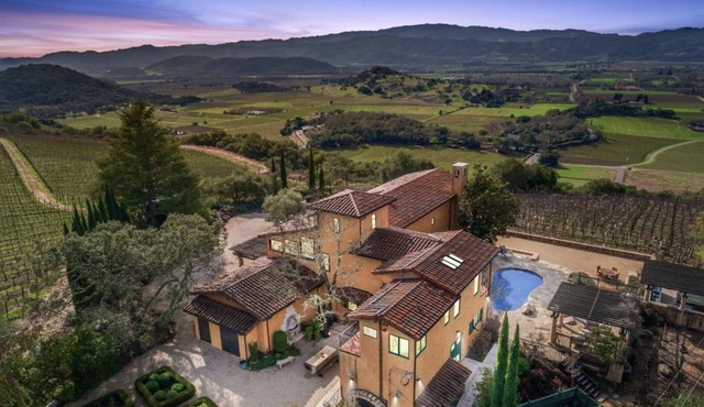 Escape to Paradise: A Stunning Tuscany-Style Home with Views of Vineyards
