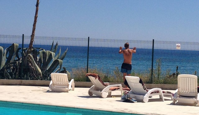 Feet in the water, sea and pool