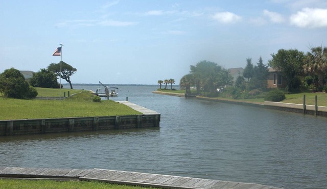 Great place to stay during the Big Rock. 4 bedrooms, private dock and marina.