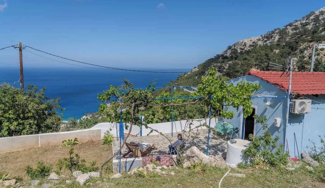 Hilltop Sea View Cottage with Private Patio