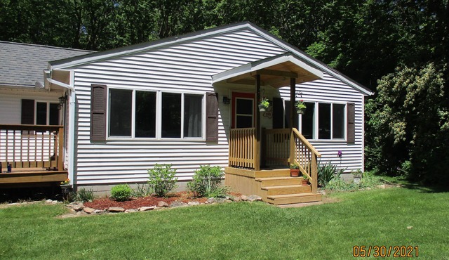 "Kelleys Island Escape" is a short walk from downtown Kelleys Island & sleeps 6.