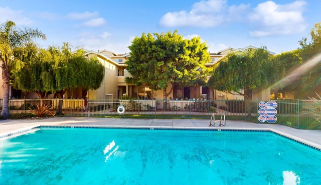 Lovely retreat with pool, hot tub, & balcony - walk to the beach - dog-friendly