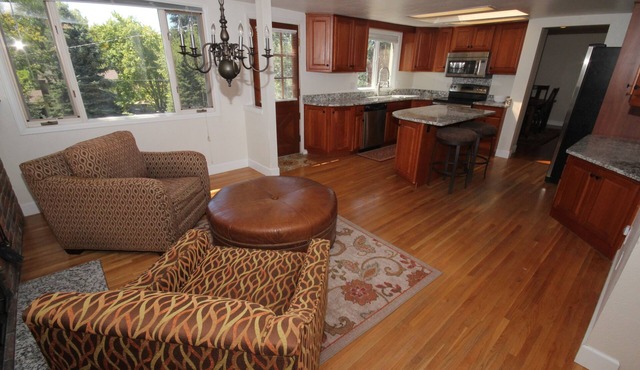 Lovely sunlit ranch style home with large fenced yard