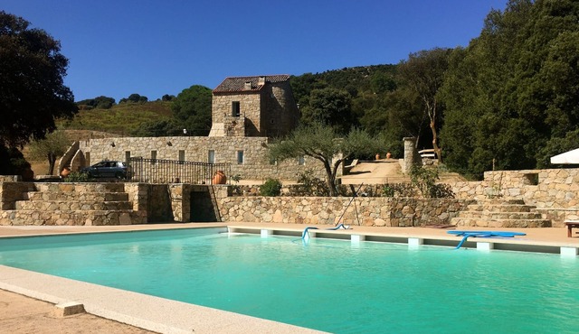 Medieval residence with swimming pool in the heart of a sixteen hectare property