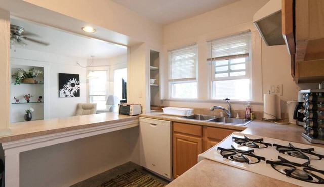 Nice 1 bedroom apartment set up with 2 queen beds with one in the living room. The kitchen and bar area still provide ample space and can accommodate up to 5 people.