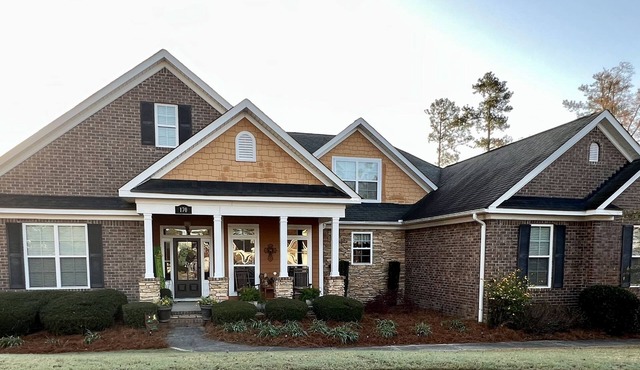 Nice private neighborhood. House is about 7 miles from the master . Charming