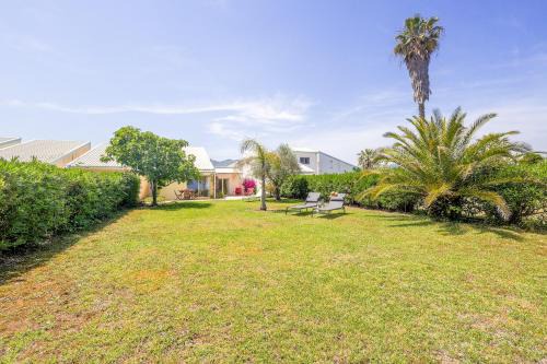 Palmeria - Maison climatisée accès direct plage