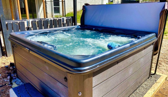 Pet-friendly home with fenced-in yard and hot tub