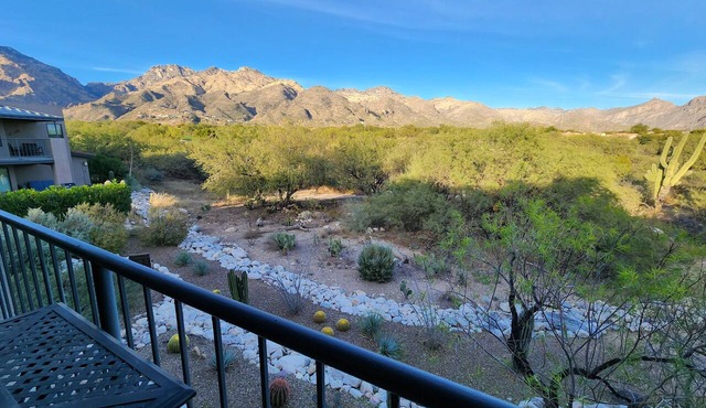 Private patio has spectacular golf -mountain views and many interior upgrades