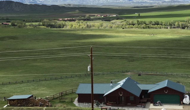 Quiet ranch setting over looking the Greybull River valley with mountain views