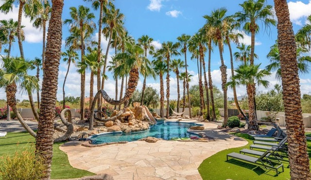 Relax in luxury at our 7-bed, 5-bath estate with rooftop deck, pool, and more!
