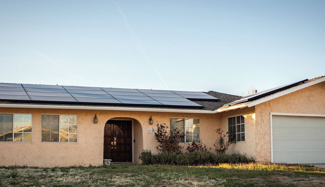 Spacious 4-bedroom home, AC, beautiful backyard with views, and deluxe hot tub.