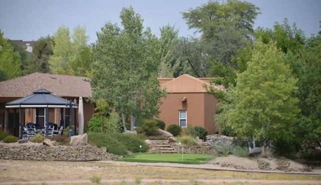 The Little Bunkhouse is on 7 acres of walk ways, a camp site and putting green.