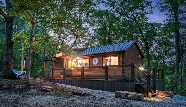 The Mighty Acorn, Bungalow is a delightful cozy tiny home in the woods.