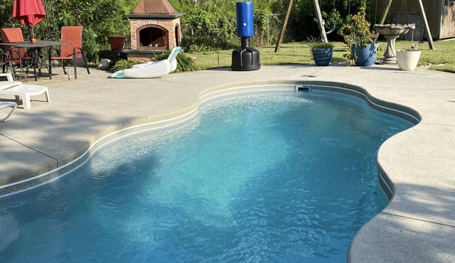 The Sutton getaway w/pool and private backyard.