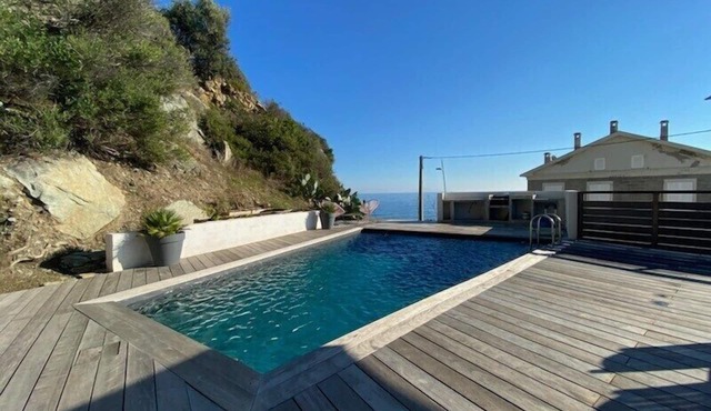 Upper floor of villa with swimming pool by the sea