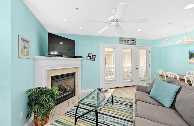 Stylish, upscale 3 bedroom condo with a television in every bedroom and living room, free WiFi, and two floors located downtown only a few streets from the boardwalk and only steps to the beach!