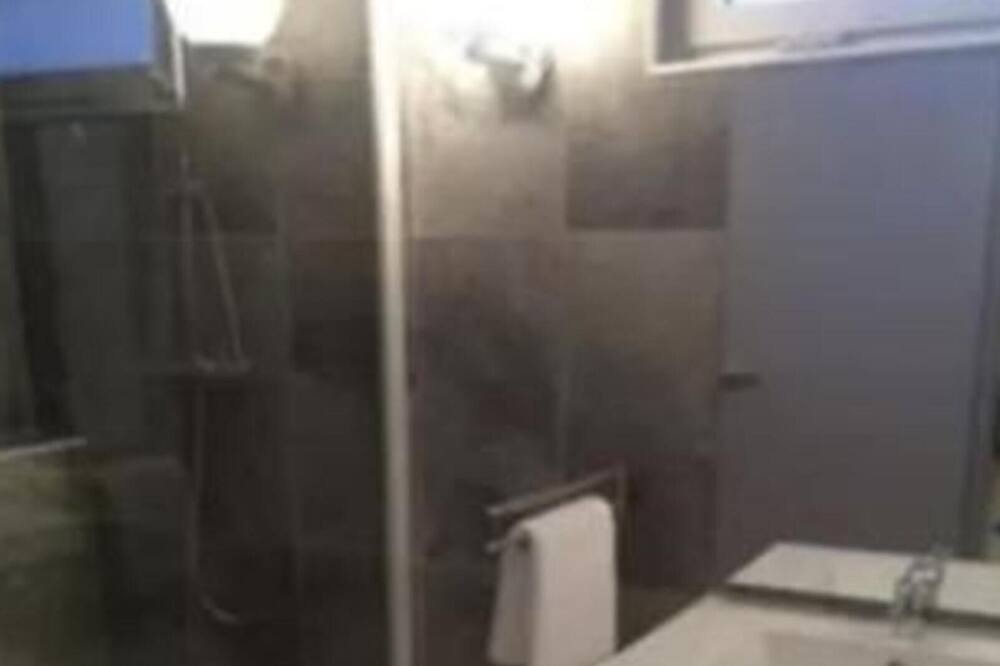 Photo of Bathroom in Residences du Golfe de Lava