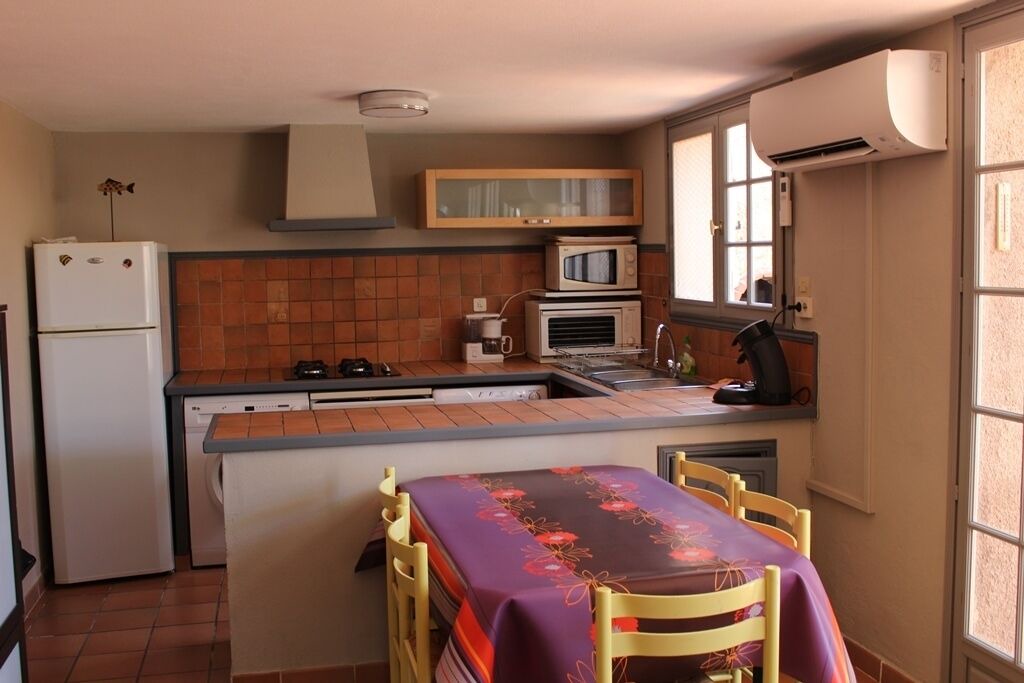 Photo of Kitchen in Residences du Golfe de Lava